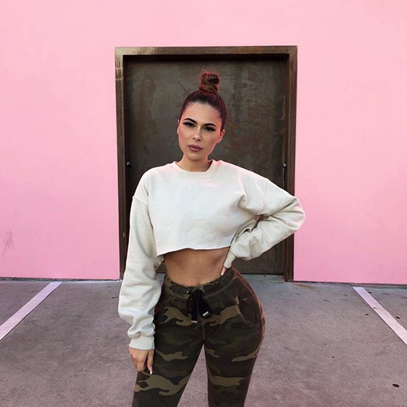 

Solid Color Crew Neck Long Sleeve Cropped Loose Sweatshirt, White