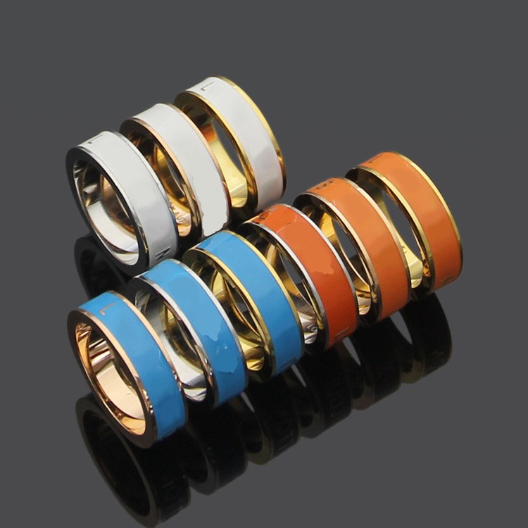 

High Quality Lover Women Designer Ring White Orange Blue Dripping Oil Gold Plated Luxurious Letter Titanium Steel Engagement Rings Fashion Jewelry