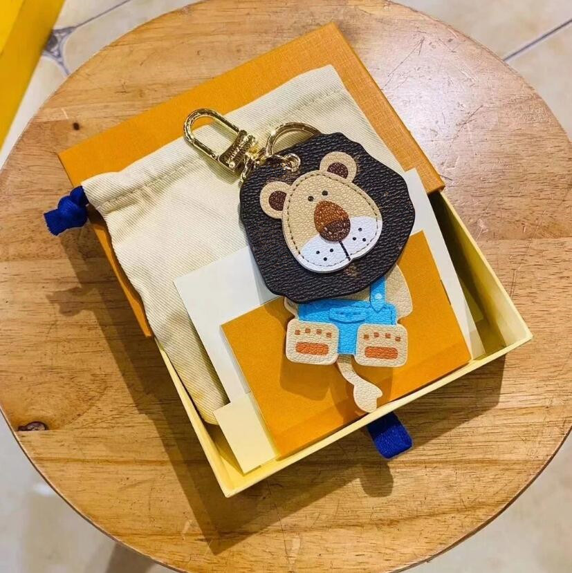 

Fashion Flower Letter Key Wallet Pendant Cute Lion Creative Car Keychain Luxury Designer Men's and Women's Leather Ornaments Keychains Couple Birthday Gift