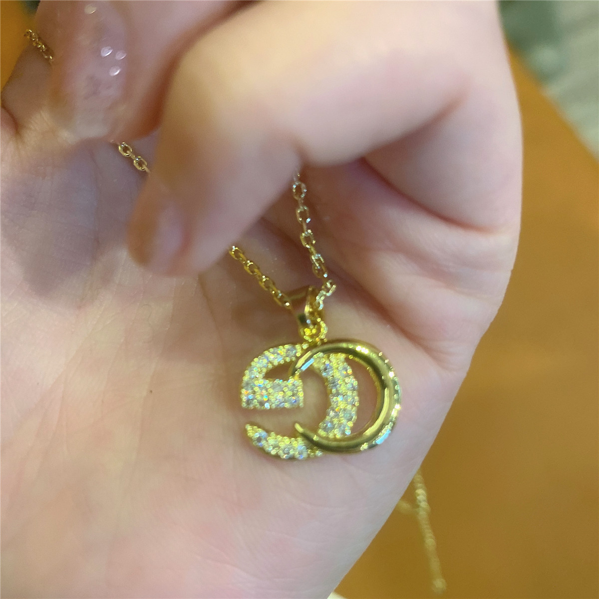 

Wholesale Letters Micro-Inlaid Zirconium Necklace Ins Korean Style Elegant Golden Circle Clavicle Chain Glossy Sweater Chain No. 6