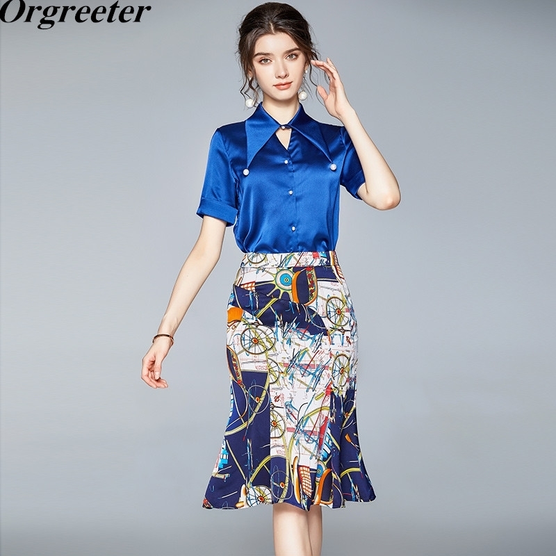 

Temperament Ladies Work Wear Suit Summer Pearl Button Simple Blue Shirt and Retro Printed Mermaid Skirt Two piece Sets 210525