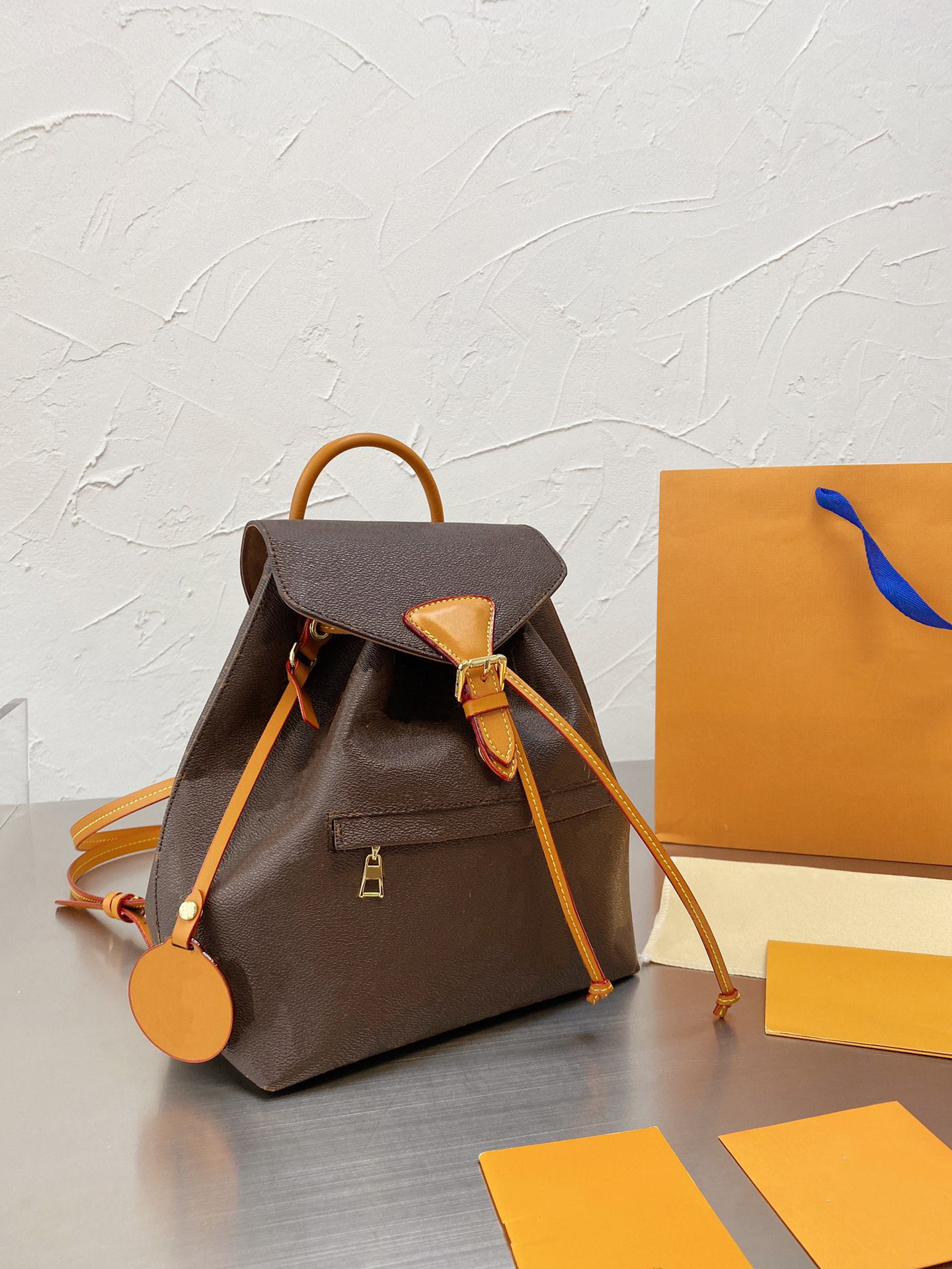 

Montsouriss Men and Women Backpack High Quality Leather Letter Pattern Luxury Designer Handbag Shoulder Bag, Same as picture description