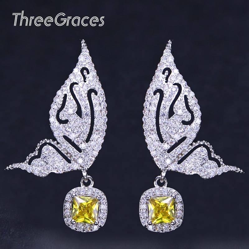

Dangle & Chandelier ThreeGraces Cute Flying Butterfly Symmetrical Designer Cubic Zirconia Yellow Earrings Fashion Ladies Party Jewelry ER135, Silver