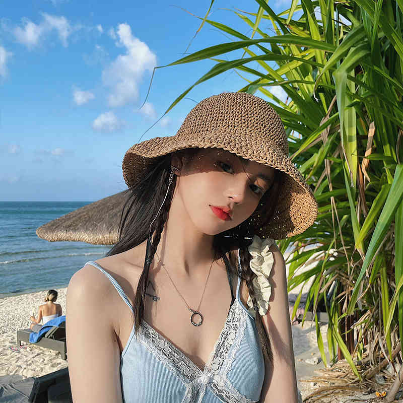 

Foldable woven straw fisherman's hat female spring summer big brim Beach Hat seaside bow sunscreen hat, Beige