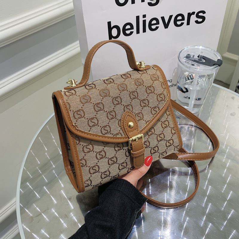 

autumn new small square fashion letter hand foreign style lock splicing messenger women's bag, White