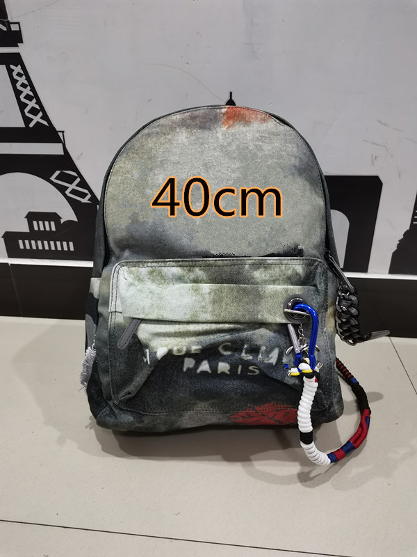 

2021 classic graffiti sports leisure backpack men and women canvas camouflage bucket bag large capacity schoolbag 40cm