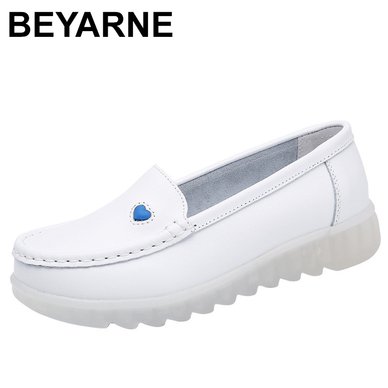 white flat nursing shoes