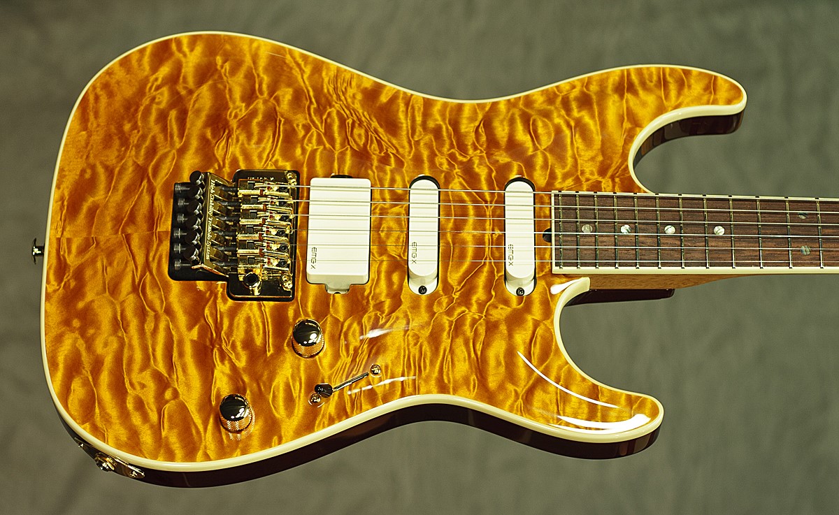 

Pensa Mark Knopfler MK-I Amber Quilted Maple Top Electric Guitar White Pickups, Floyd Rose Tremolo bridge & locking nut, Gold Hardware