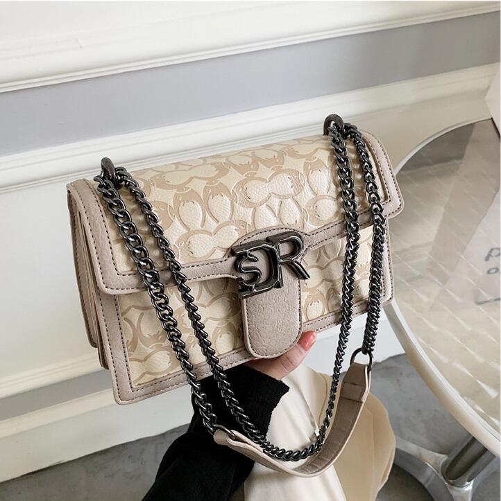 

Wholesale factory ladies leathers shoulder bags Hong Kong style elegant embossed chain bag sweet ladies fashion backpack clamshell shaped leather handbag, White3-342