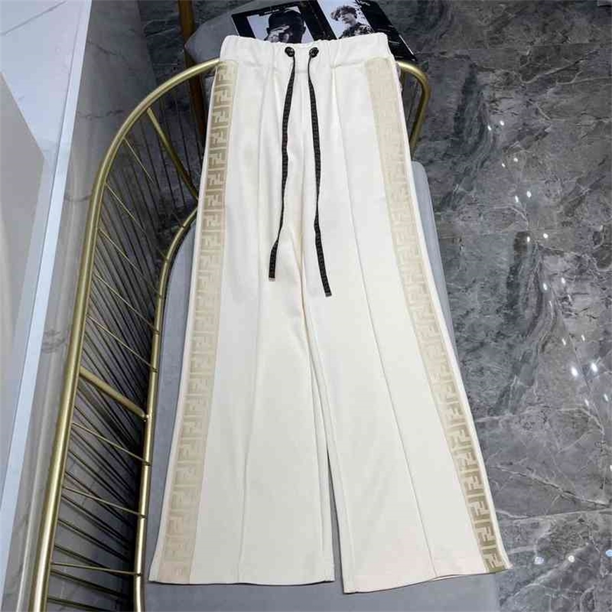 

Chaopai family letter embossed capsule series casual straight pants, Apricot