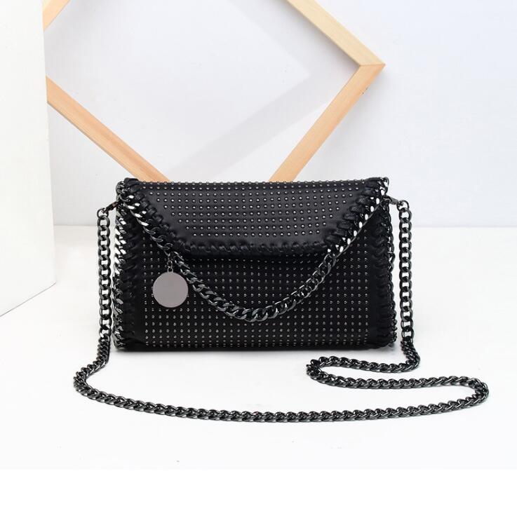

Factory wholesale women bag street fashion rivet solid color leather handbag exquisite hardware rivets punk shoulder bags simple atmospheric contrast handbags