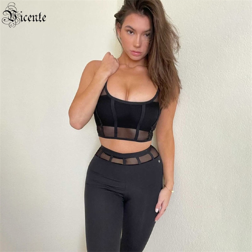 

Fashion Black Mesh Stitching Bandage Two-piece Design Celebrity Party Crop Top Pants Suit 210520