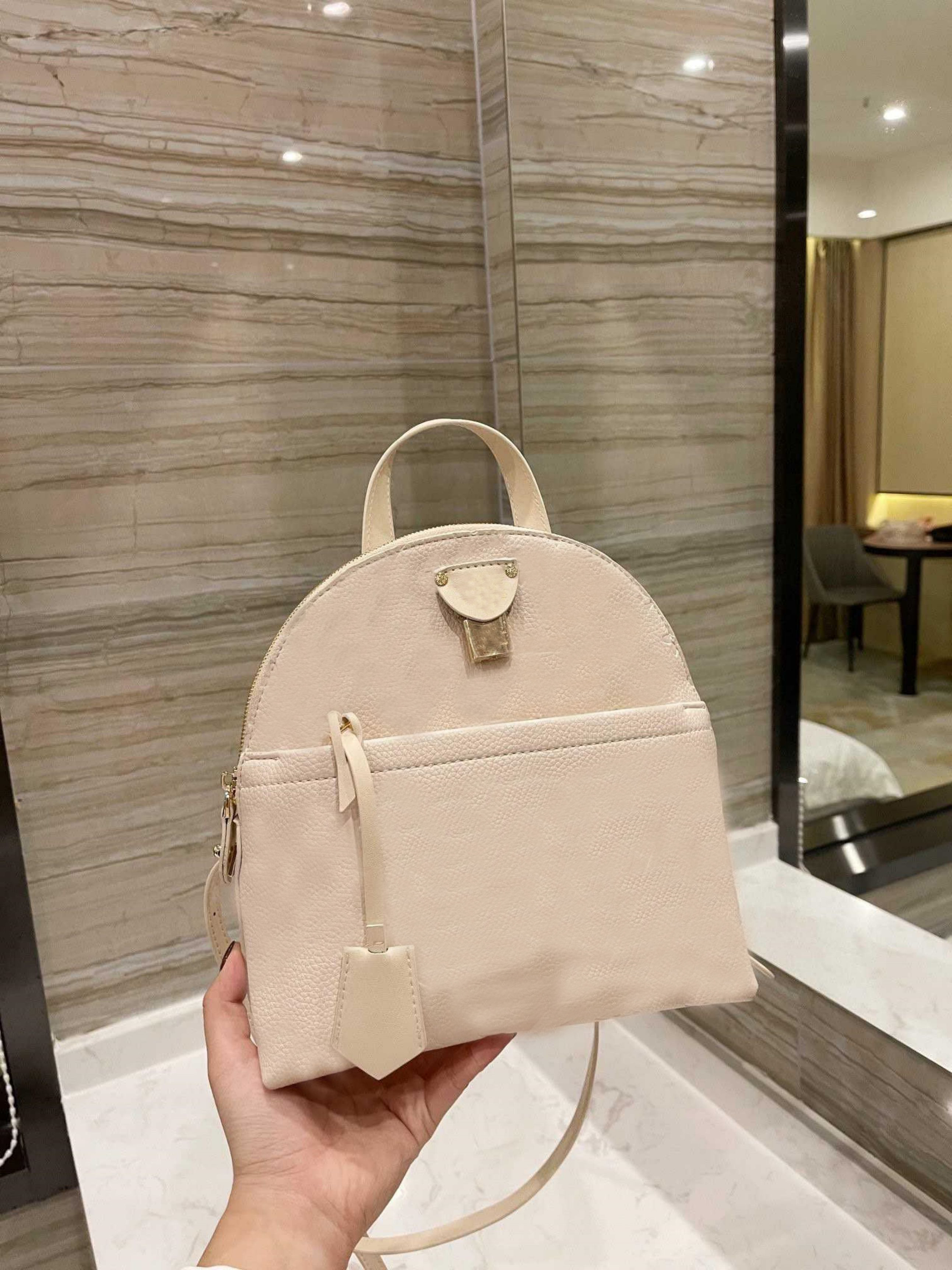 

Designer Bags Casual mini Backpack designers handbags subtitle handbag Vernis crossbody bag Womens luxurys fashion, 23cm