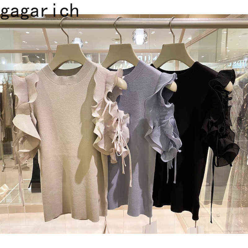 

Gagarich Woman Blouses 2021 Summer New Elegant Temperament Folds Ruffles Chiffon Stitching Lace Solid Off Shoulder Knitting Top Y1110, Black