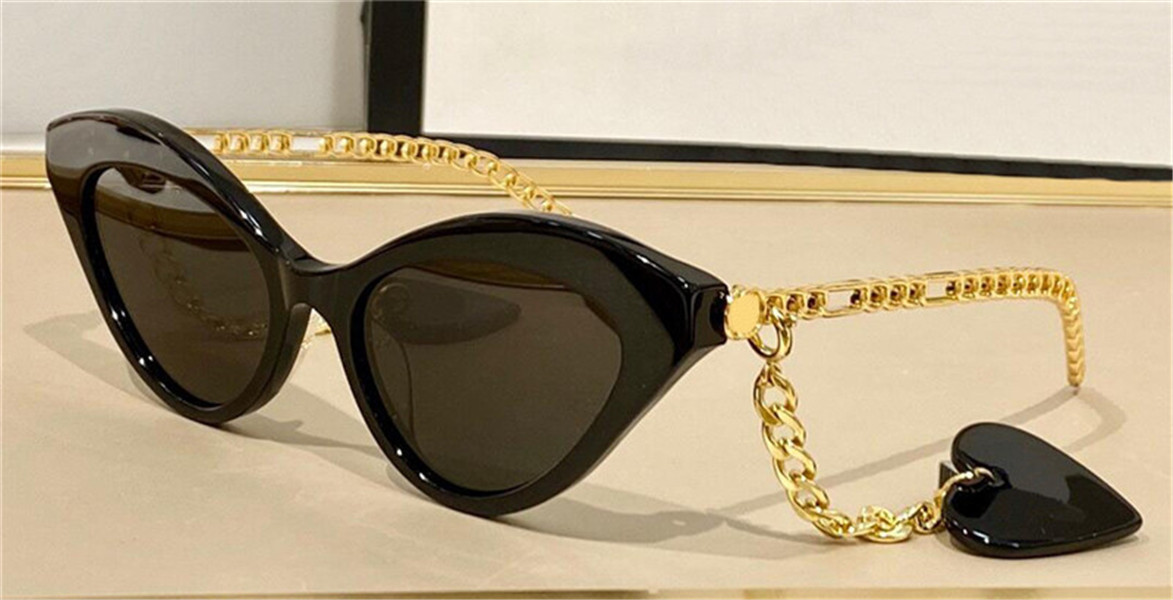 

fashion design woman sunglasses 0978S cat eye frame popular and versatile style top quality outdoor uv400 protective eyewear with heart-shaped glasses chain