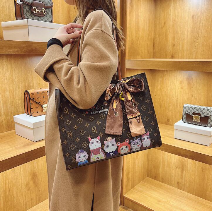 

Wholesale factory ladies shoulder bags elegant Joker contrast leather fashion handbags classic old color bow retro handbag street trend Plaid Tote bag