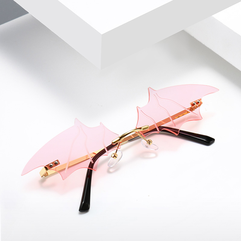 

2021 Arrival Fox Eyes Flame Sunglasses Women Brand Designer Rimless Wave Eyewear Luxury Trending Narrow Sun glasses Oculos