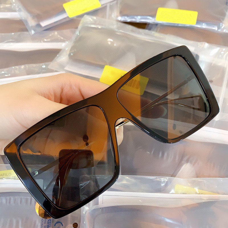 

Progettista sunglasses 0434S mens and womens travel driving black frame metal temples cool glasses unisex designer top quality with original box