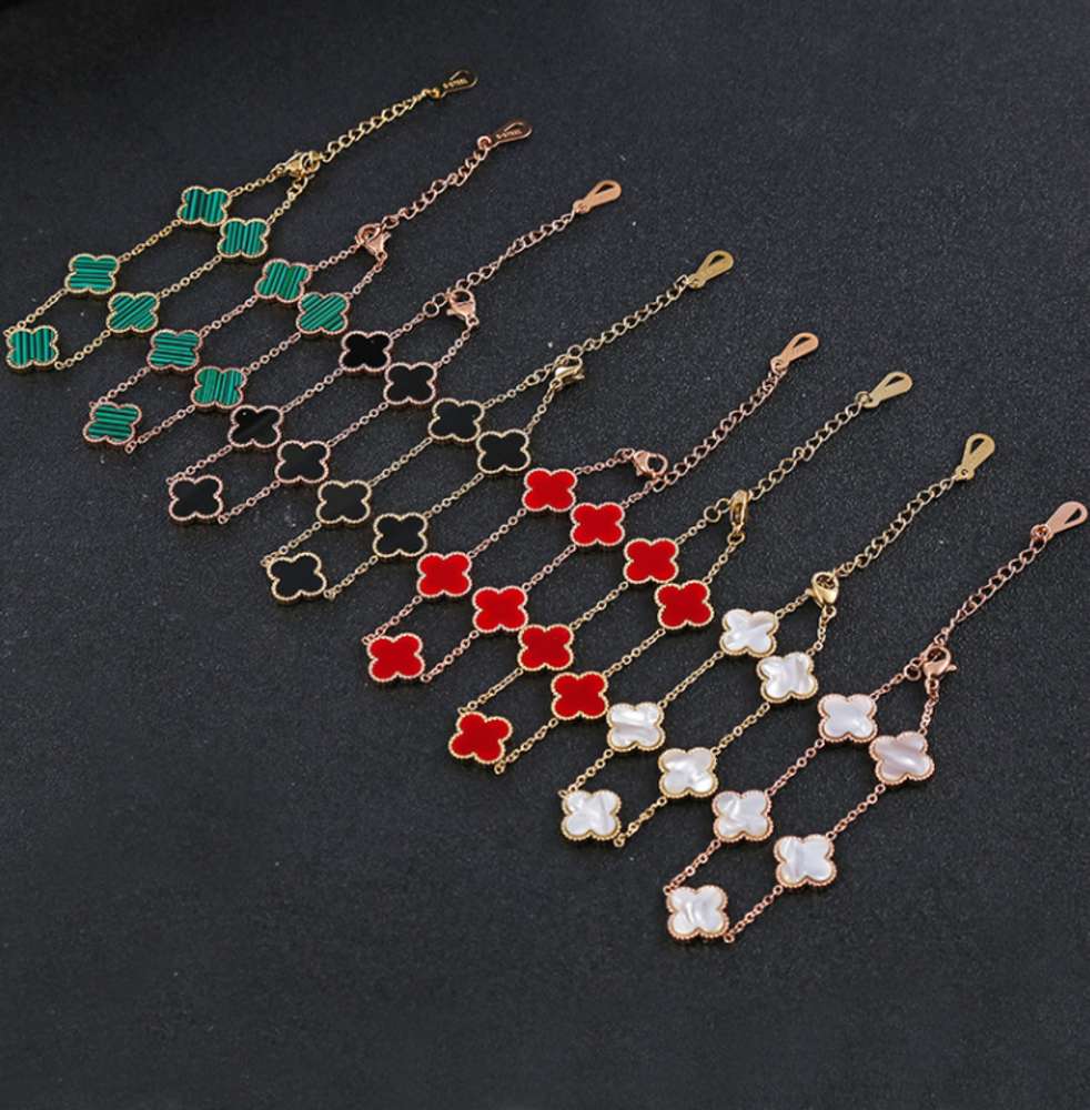 

DanYuan green black white red steel clover bracelet