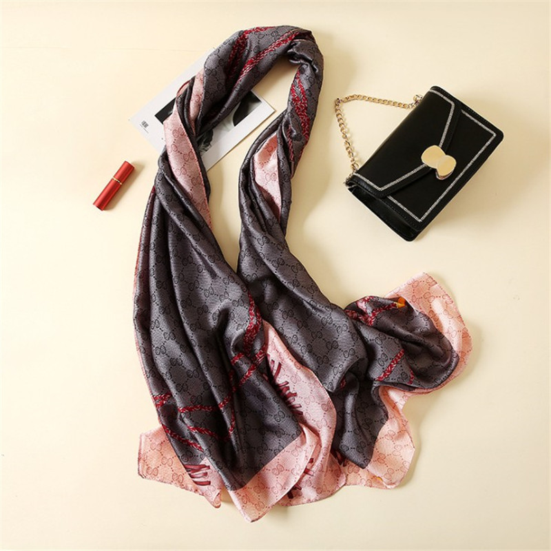 

Sarongs Sharon Chunqiu new imitation silk scarf women's European and American fashion thin summer sunscreen beach shawl