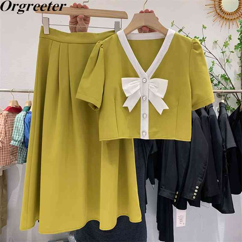 

Vintage Hepburn style Pearl Button V-neck Puff sleeve Bowknot Cropped Tops and High waist Long Skirt Two-piece Sets Women 210602, Black