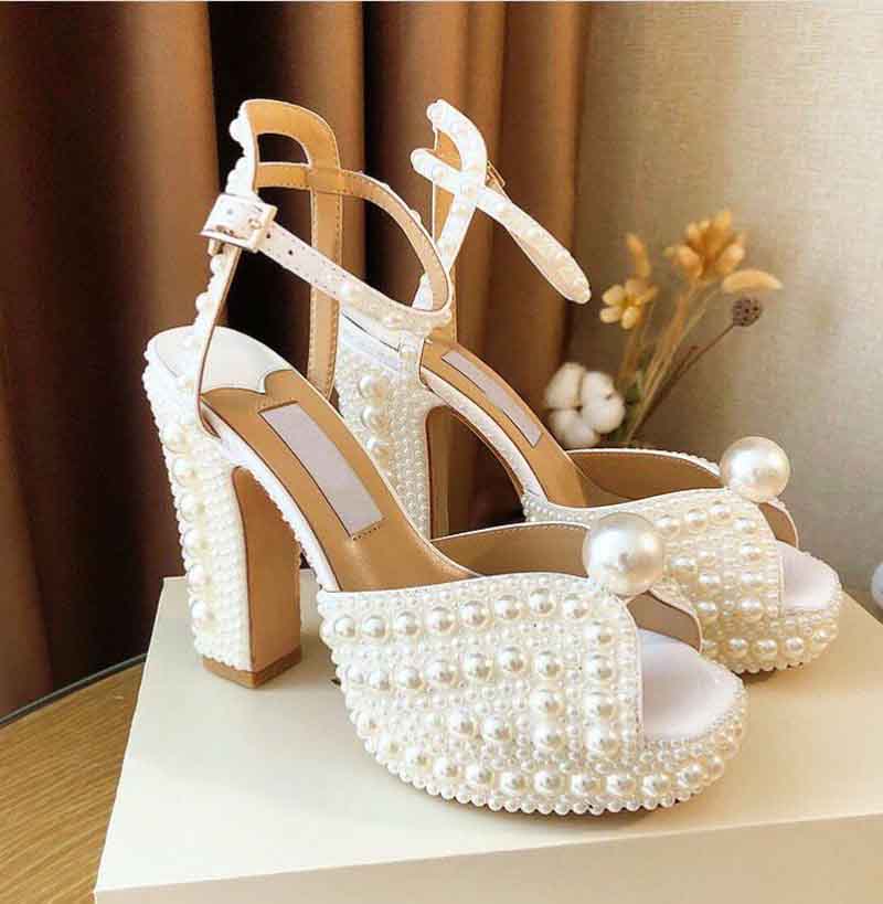 

Women wedding party dress pumps summer sandals Sacaria sweet rice white pearl hollow fish mouth high-heeled temperament word buckle female sandal EU35-42
