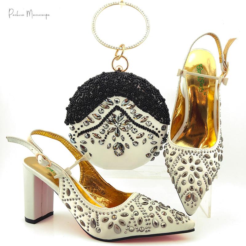 

Mature Nigerian Women Royal Wedding Party Shoes And Bag To Match With Shining Crystal In White Color Italian Style Set Dress, Black
