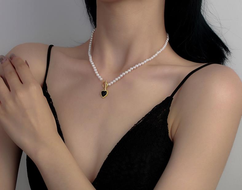 2021 Fashion temperament design sense pearl love clavicle chain necklaces women&#039;s European and American Jewelry gift-image-703621861
