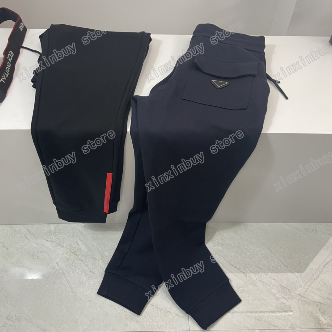 

21ss France Mens womens designer pants fashion Italy pant Metal triangle Red label Nylon pocket men women casual cotton Black navy blue M-2XL