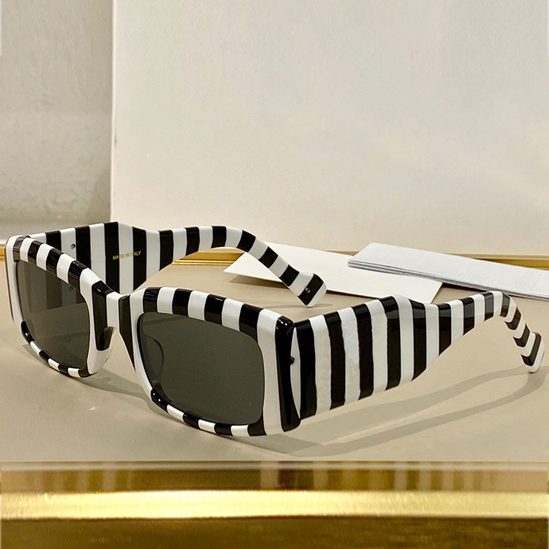 

Sunglasses for men 0071SS womens fashion trend letter newspaper pattern design all-match black white zebra stripes square thick frame UV400 high version glasses