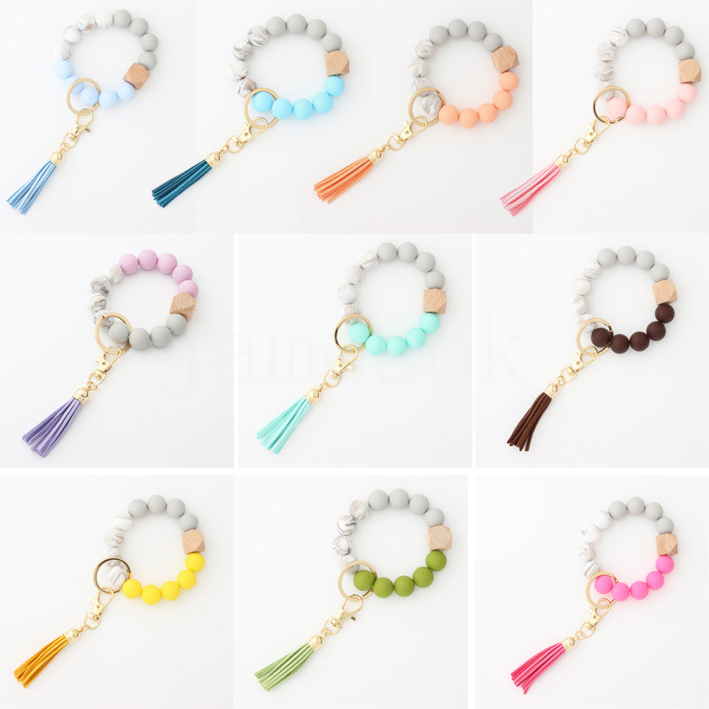 

Party Favor Keychain Wooden Tassel String Chain Food Grade Silicone Bead Women Girl Key Ring Wrist Strap Bracelet DD033