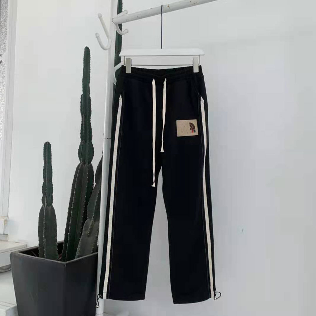 

New products in spring and summer of 2021 co branded letter sticker printing side stripe contrast stitching casual pants, Black