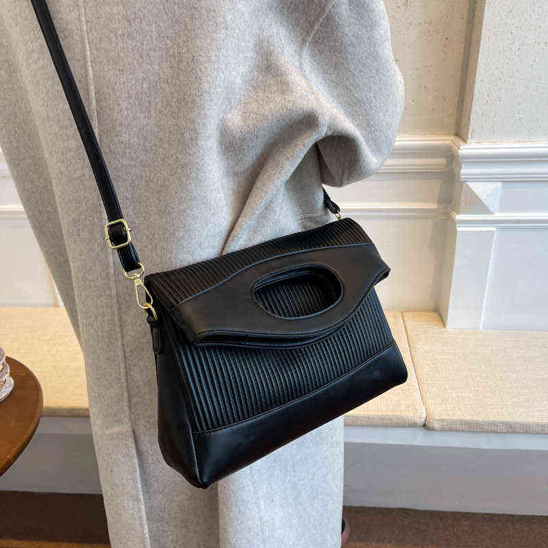 designer saddle handbolsas