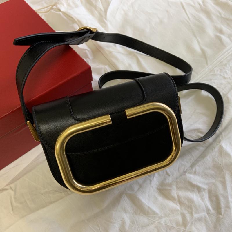 

style 1011s women bags capacity is ok imported leather feels soft three storage pockets the buttons open and close genuine leather bags