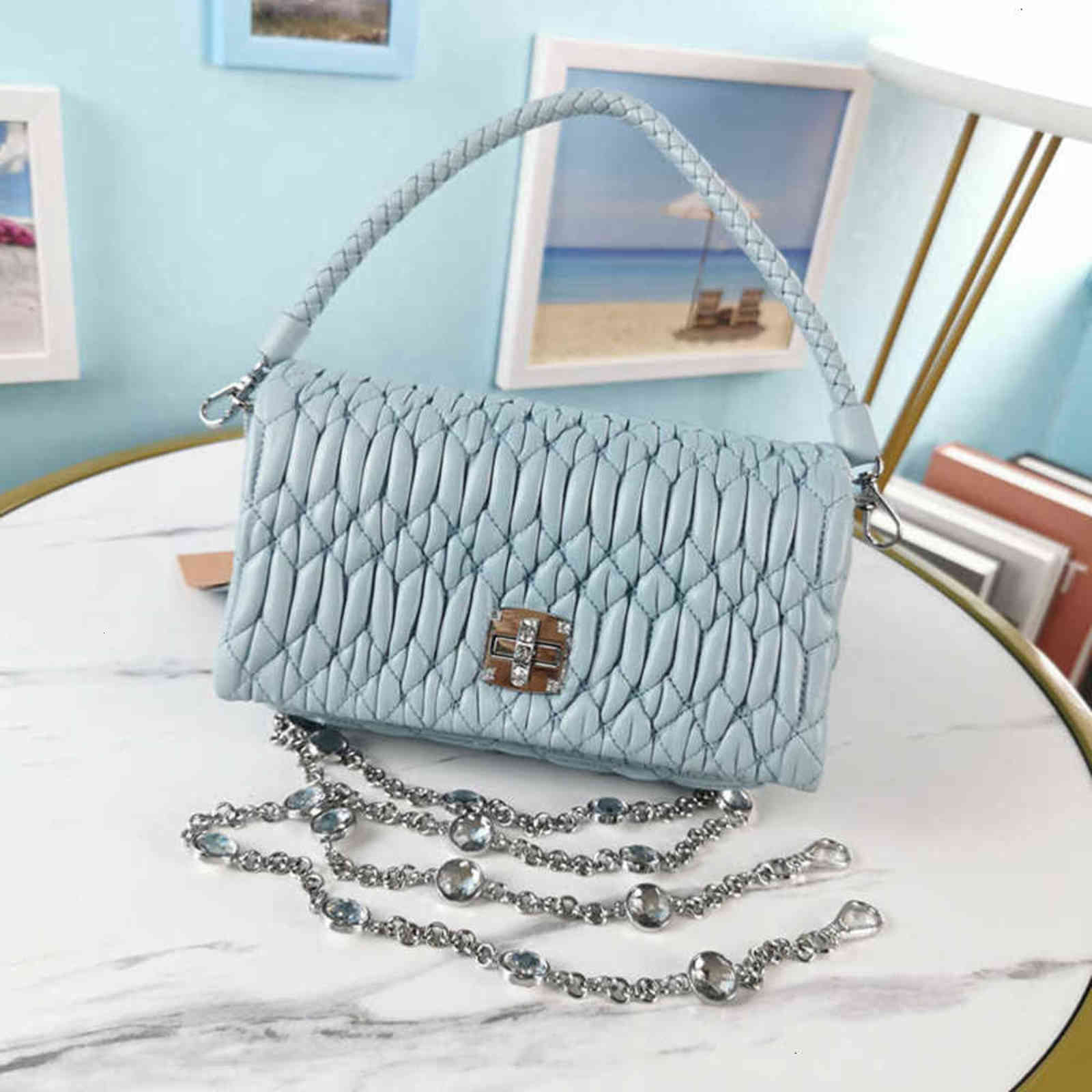 

7A+Fashion New style 5BH012 women bags Imported lamb skin Braided leather hand holder Removable crystal imitation chain The leather is fine
