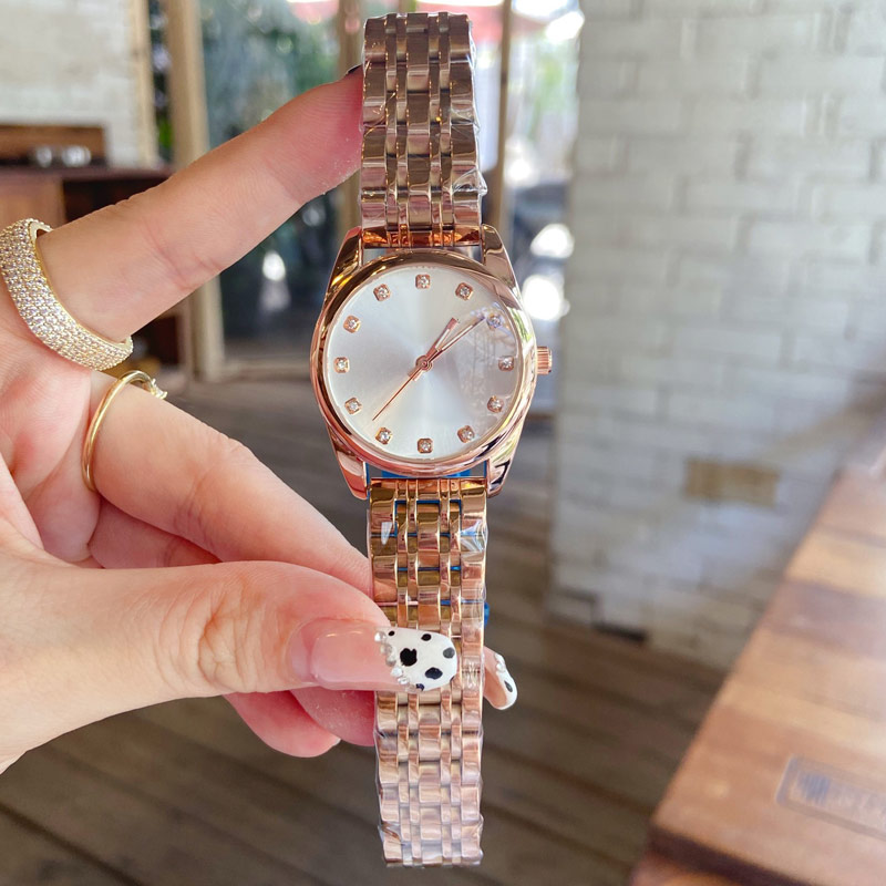 

Stainless Steel Diamond Dial Lady Watch: Luxury Designer Gift for Women - Green, White & Black. Perfect for Mother's Day & Valentine's