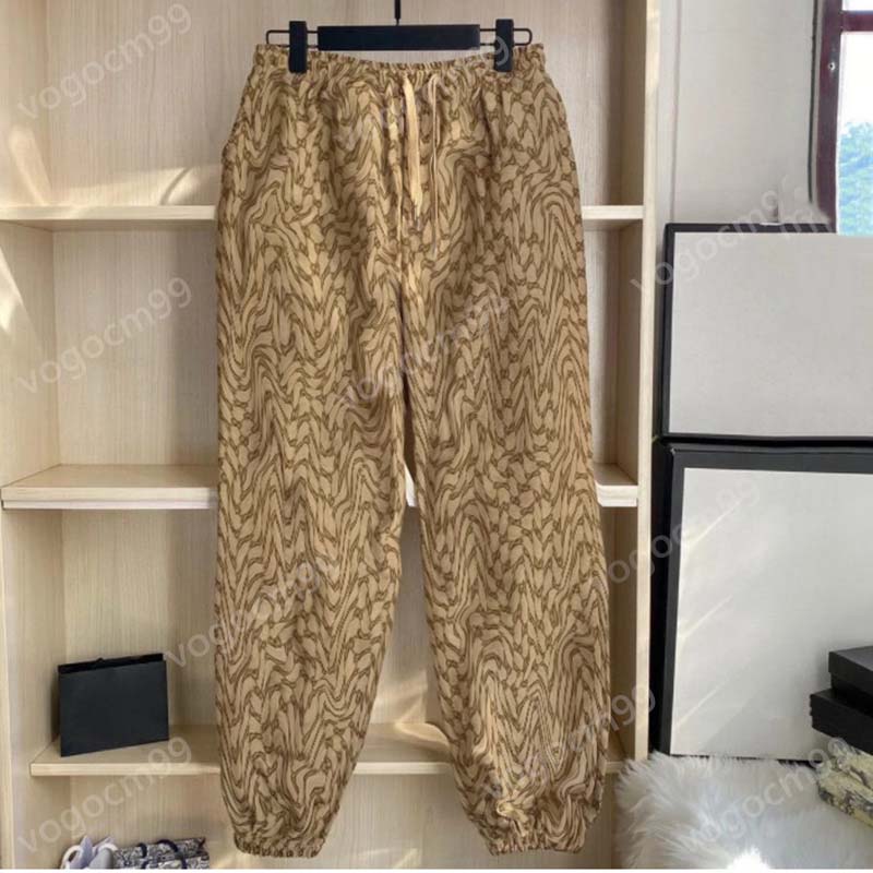 Pantalon Hommes Femme Pantalons Lettres Lettres Jacquard Elastic Corset Corsot Panton Casual Hommes et Femmes Les mêmes pantalons de survêtement