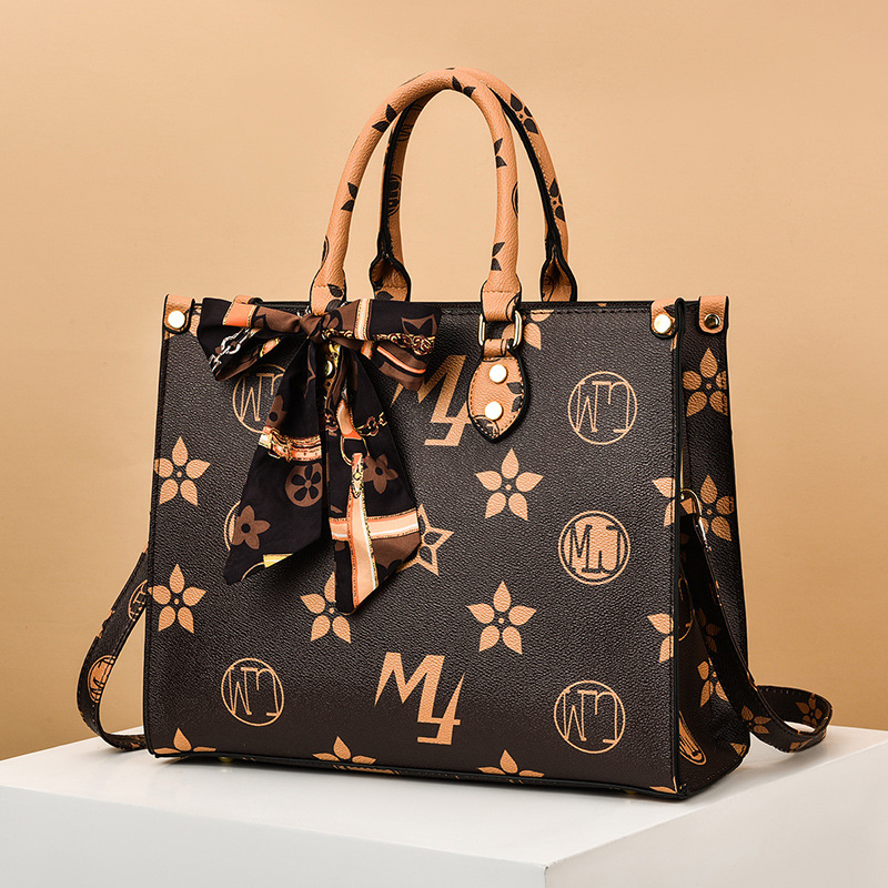 

Wholesale ladies leather shoulder bags Hong Kong elegant large-capacity printing Tote bag street trend polka dot Joker handbag retro old color women handbags