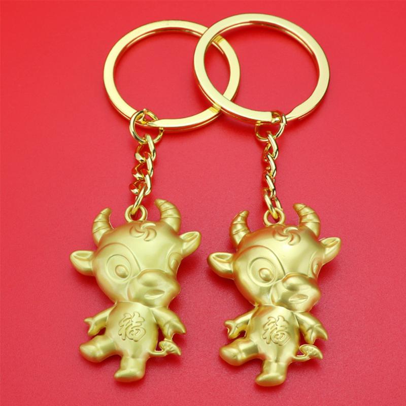 

Keychains 1PC Ox Year Lucky Key Ring Pendant Bull Keychain Gift Souvenire