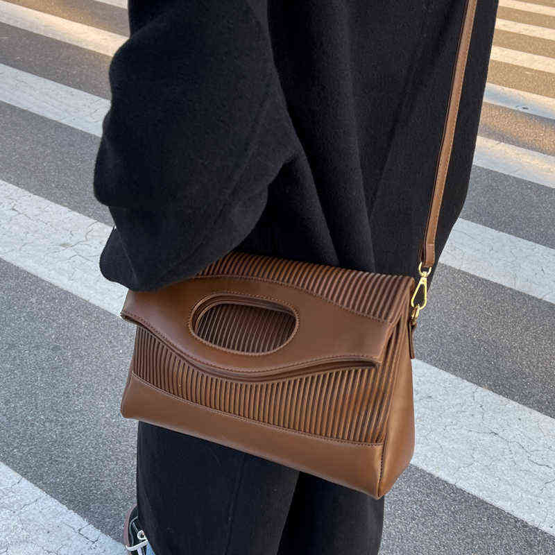 designer saddle handbolsas