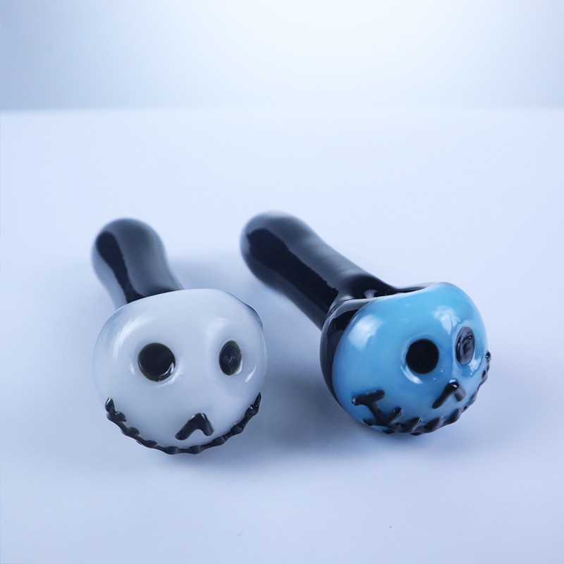 

4.3'' Halloween theme glowing in the dark bone face glass pipe