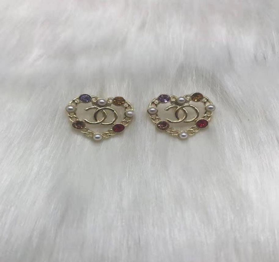 

Xiangjia xiaoxiangfeng pearl color stone heart-shaped Earrings 925 silver needle fashion temperament earrings earrings female