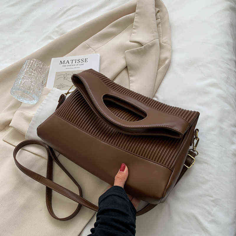 designer saddle handbolsas