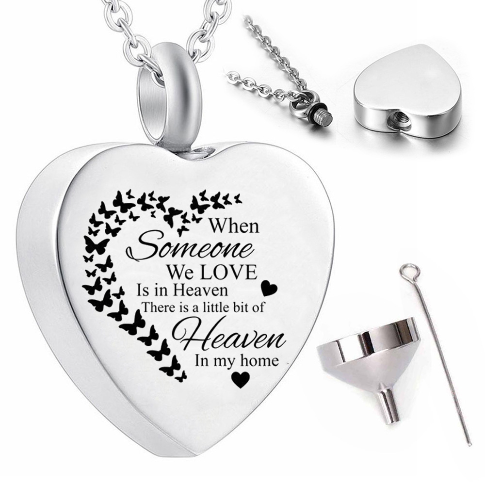 

Heart shaped butterfly pendant necklace cremation jewellery to commemorate family or pets - when someone we love is in heaven...