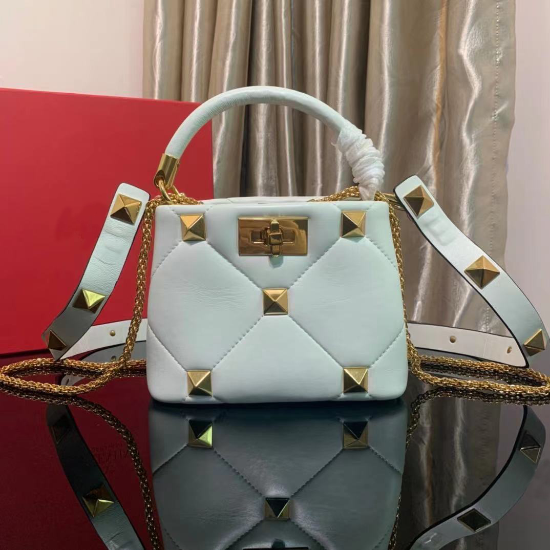 

Roman Stud The Handle Bag 520 high quality mini bucket bags Classic drawstring handbag with chain strap cross body women embellished leather Rivet handbags purse, Fuchsia