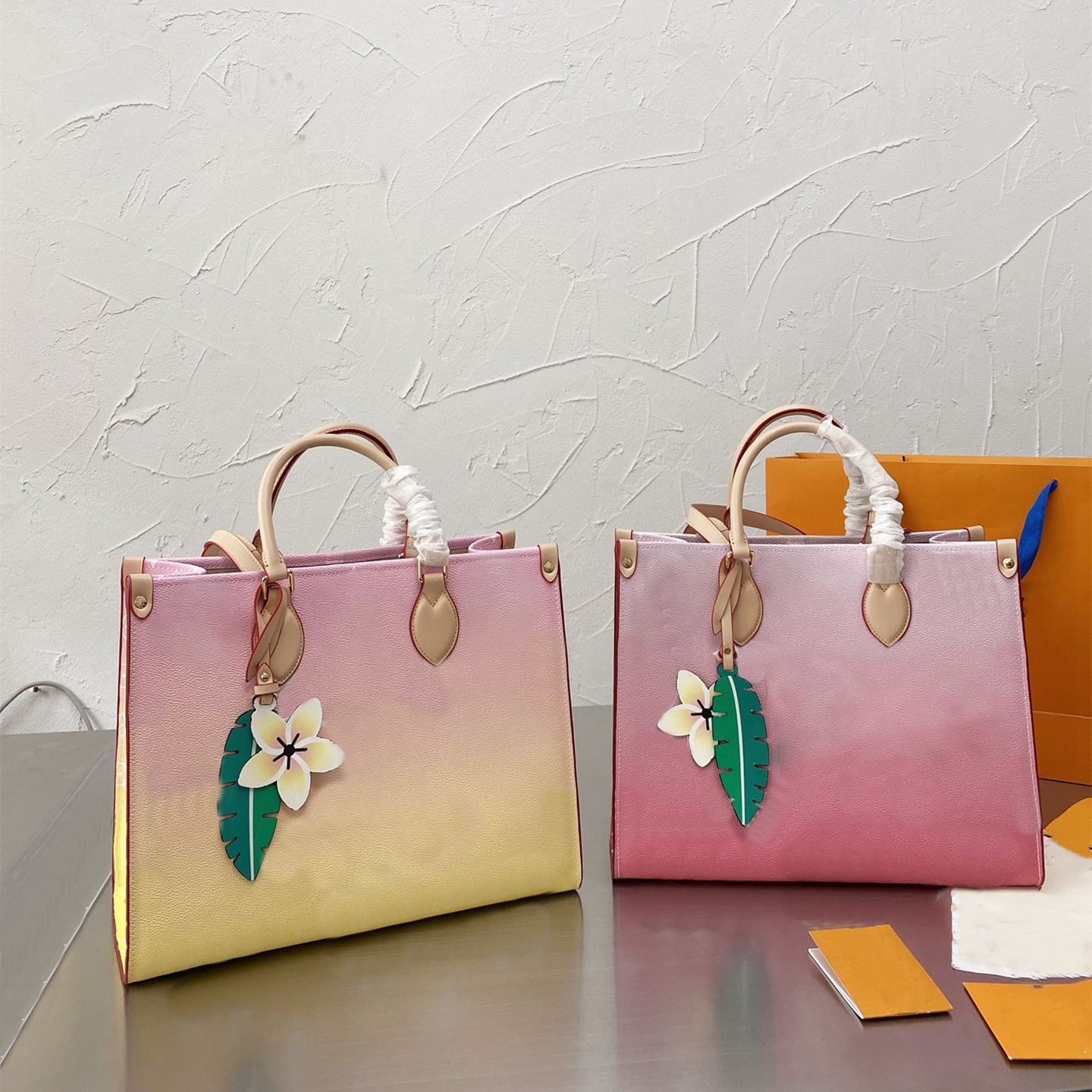 

High-quality Women Leather Tote Luxurys Designer Handbag Female Fashion Messenger ONTHEGO Handbags Purse lovebag98