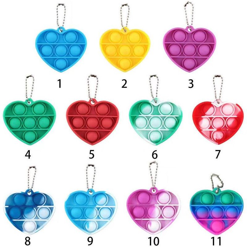 

Fidget Toys Stress Reliever Sensory Toy with Simple Dimple Silicone Squeeze Key chain for Adults and Autistic Children