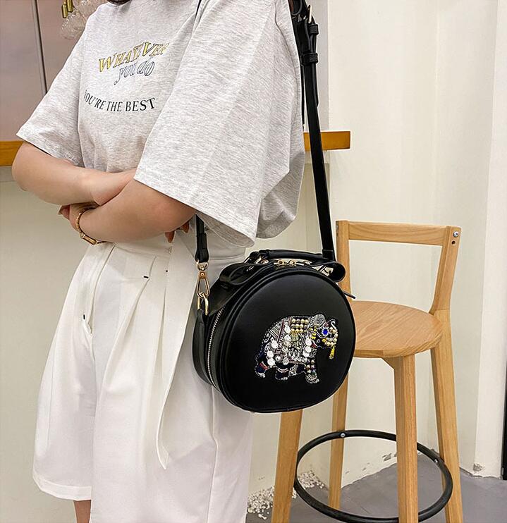 

Factory wholesale brand women shoulder bag sweet round elephant cartoon leather handbag street trend sequin embroidery messenger bags personality rivet handbags