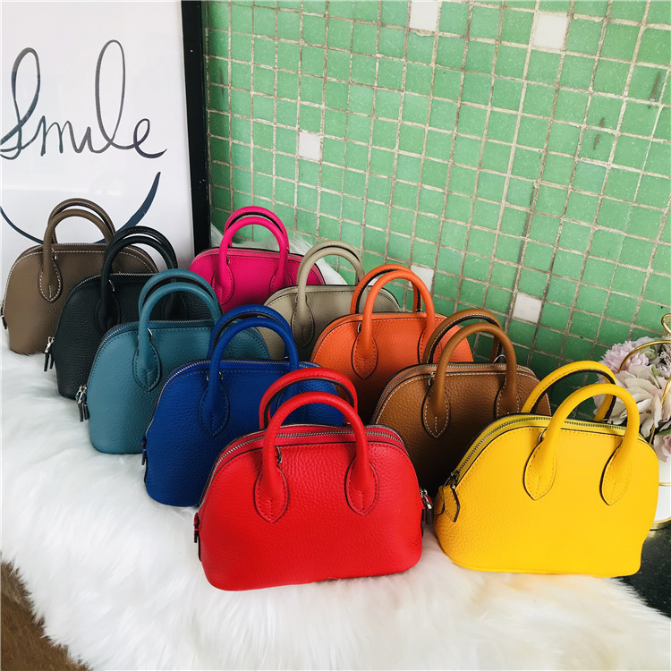 

New Mini Handbag head leather one shoulder straddle shell zipper hand cattle women's Purses Luxury Outlet, Yellow
