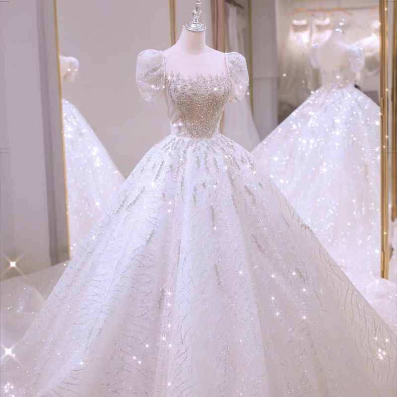 

Sparkly Crystals Sequined Ball Gown Wedding Dresses 2022 Sheer Neck Short Puff Sleeves Luxurious Arabic Bridal Gowns Princess Long Train Vestidos De Novia AL9631, White